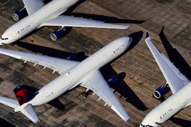 Delta Air Lines passenger planes are seen parked at Birmingham-Shuttlesworth International Airport in Birmingham, Alabama, U.S. March 25, 2020. 