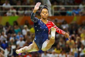 2016 Rio Olympics - Artistic Gymnastics - Preliminary - Women's Qualification - Subdivisions - Rio Olympic Arena - Rio de Janeiro, Brazil - 07/08/2016. Gabrielle Douglas (USA) of USA (Gabby Douglas) competes on the beam during the women's qualifications.  