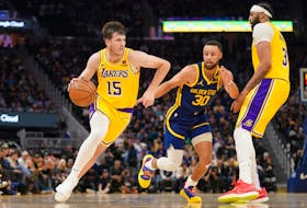 Feb 22, 2024; San Francisco, California, USA; Los Angeles Lakers guard Austin Reaves (15) dribbles past Golden State Warriors guard Stephen Curry (30) in the second quarter at the Chase Center. Mandatory Credit: Cary Edmondson-USA TODAY Sports/ File photo