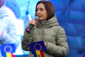 Moldovan President Maia Sandu addresses participants of a rally and concert, who celebrate the European Union's decision to open membership talks with Moldova, in Chisinau, Moldova, December 17, 2023.