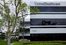The corporate logo of the UnitedHealth Group appears on the side of one of their office buildings in Santa Ana, California, U.S., April 13, 2020.     