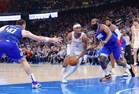 Feb 22, 2024; Oklahoma City, Oklahoma, USA; Oklahoma City Thunder guard Shai Gilgeous-Alexander (2) moves between LA Clippers guard James Harden (1) and center Ivica Zubac (40) during the second quarter at Paycom Center. Mandatory Credit: Alonzo Adams-USA TODAY Sports