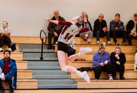 The Holland Hurricanes’ Morgan White, 14, jumps in the air and focuses on hitting the ball during an Atlantic Collegiate Athletic Association (ACAA) Women’s Volleyball Conference game in Charlottetown earlier this season. The Hurricanes defeated the St. Thomas Tommies 3-0 in a quarter-final match in Saint John, N.B., on Feb. 23. Holland College Photo • Special to The Guardian