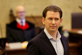 Austria's conservative former Chancellor Sebastian Kurz waits in the courtroom before his trial for perjury in Vienna, Austria, February 23, 2024.
