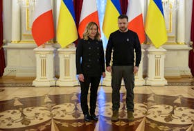 Ukraine's President Volodymyr Zelenskiy and Italian Prime Minister Giorgia Meloni pose for a picture before their meeting on the second anniversary of Russia's invasion of Ukraine, Kyiv, February 24, 2024. Ukrainian Presidential Press Service/Handout via REUTERS