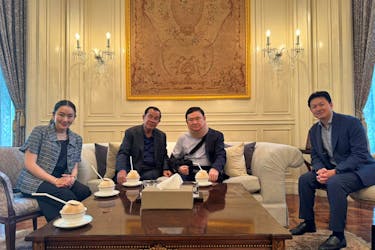 Cambodia's former Prime Minister Hun Sen poses for a picture during his meeting with Thailand's former Prime Minister Thaksin Shinawatra, in a location given as Bangkok, Thailand, in this handout image released on February 21, 2024. Hun Sen Via Facebook/Handout via