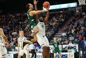 The UPEI Panthers’ Jace Colley, 3, drives to the basket as the Saint Mary’s Huskies’ Jackson Enyinna, 10, defends in an Atlantic University Sport (AUS) Men’s Basketball Conference quarter-final game at Scotiabank Centre in Halifax on Feb. 23. The Huskies won the contest 68-64. Nick Pearce Photo • Special to The Guardian