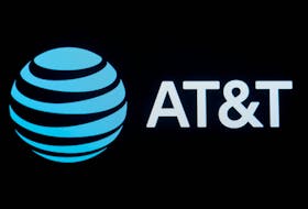 The company logo for AT&T is displayed on a screen on the floor at the New York Stock Exchange (NYSE) in New York, U.S., September 18, 2019.