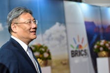 Chinese Commerce Minister Wang Wentao arrives at the BRICS Summit in Johannesburg, South Africa August 23, 2023.