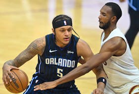 Feb 22, 2024; Cleveland, Ohio, USA; Orlando Magic forward Paolo Banchero (5) dribbles beside Cleveland Cavaliers forward Evan Mobley (4) in the first quarter at Rocket Mortgage FieldHouse. Mandatory Credit: David Richard-USA TODAY Sports/ File Photo