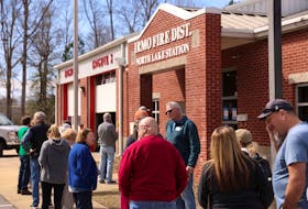 People wait in line to cast their vote at the Northlake Fire Station during the Republican presidential primary election on Election Day, in Irmo, South Carolina, U.S. February 24, 2024.