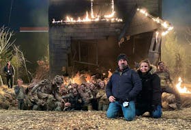 Stunt co-ordinator Guy Bews and assistant stunt co-oridinator Maggie Macdonald on the set of The Last of Us. The scene required more than 100 stunt performers, some of them are in the pit.