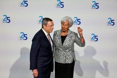 European Central Bank president Christine Lagarde speaks with former ECB president Mario Draghi during a ceremony to celebrate the 25th anniversary of the ECB, in Frankfurt, Germany, May 24, 2023.
