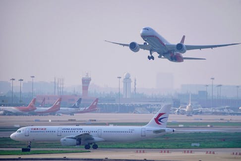 A China Eastern Airlines aircraft and  Shanghai Airlines aircraft are seen in Hongqiao International Airport in Shanghai, following the coronavirus disease (COVID-19) outbreak, China June 4, 2020.