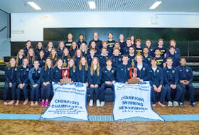 The Dalhousie Tigers captured both the men's and women's AUS swimming team   championships on Sunday at Dalplex. - Trevor MacMillan / Dalhousie Athletics