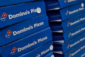 Domino's pizza boxes are pictured inside a restaurant in Noida, India, July 4, 2023.