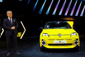 Renault Group's CEO Luca de Meo, stands next to the Renault 5 Electric car displayed on the media day of the 91st Geneva Auto Show, in Geneva, Switzerland, February 26, 2024.