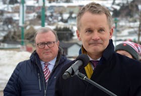 MP Seamus O’Regan speaks during a housing announcement in Mount Pearl Monday morning as Mount Pearl Mayor Dave Aker (left) looks on. Keith Gosse • The Telegram