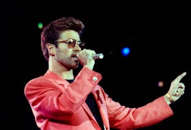 Singer George Michael performs at the Freddie Mercury Tribute Concert for AIDS Awareness at Wembley Stadium in London, Britain, April 20, 1992. Michael died on December 25, 2016.  