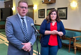 Newfoundland and Labrador Teachers’ Association President Trent Langdon (left) and Education Minister Krista Lynn Howell (right) speak with reporters gathered outside the House of Assembly after the virtual Teachers’ Think Tank on Friday. -Juanita Mercer/SaltWire