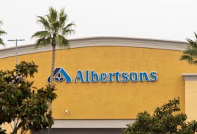 The Albertsons logo is seen on an Albertsons grocery store, as Kroger agrees to buy rival Albertsons in a deal to combine the two supermarket chains, in Riverside, California, U.S., October 14, 2022. 