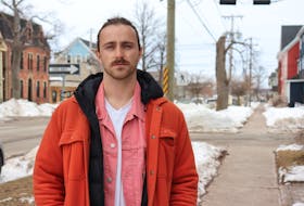 Ryan MacRae, an organizer with P.EI. Fight for Affordable Housing, says the organization is circling a petition that asks city council to reverse a decision that allows some owners to have multiple short-term rentals. - Logan MacLean