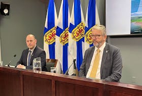 Environment Minister Tim Holman and Housing Minister John Lohr introduce the provincial government's plan for climate-resilient coastal communities at One Government Place in Halifax on Monday, Feb. 26, 2024.