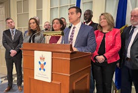 Leader Zach Churchill and Liberal caucus members take part in a news conference about the spring session of the Nova Scotia legislature at Province House in Halifax on Monday, Feb. 26, 2024. - Francis Campbell