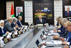 Palestinian Prime Minister Mohammad Shtayyeh convenes a cabinet meeting, amid reports about Prime Minister Shtayyeh announcing his resignation, in Ramallah in the Israeli-occupied West Bank, February 26, 2024.