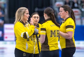 Lead Lauren Lenentine, right, chats with teammates Karlee Burgess, second right, Jennifer Jones, left, and Emily Zacharias during a break in action at the Scotties Tournament of Hearts in Calgary. Lenentine is from New Dominion, P.E.I. The Jones-skipped rink dropped a 5-4 decision to Ontario’s Rachel Homan in the final of the Canadian women’s curling championship on Feb. 24. Curling Canada / Andrew Klaver