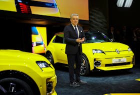 Renault Group's CEO Luca de Meo, speaks as he stands next to the Renault 5 Electric car displayed on the media day of the 91st Geneva Auto Show, in Geneva, Switzerland, February 26, 2024.
