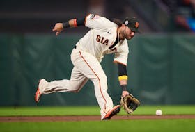 Sep 11, 2023; San Francisco, California, USA; San Francisco Giants infielder Brandon Crawford (35) fields a ground ball against the Cleveland Guardians during the fourth inning at Oracle Park. Mandatory Credit: Robert Edwards-USA TODAY Sports/File Photo