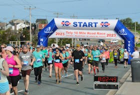 SHOT 25 JUNE 2023 JOE GIBBONS/The Telegram Runners and walkers make their way along the route from the start line in Paradise along Harvey Road and on Military Road as they were heading for the home stretch to the finish line at Bannerman Park during the 95th. edition of the Tely 10, 10-Mile road race on Sunday morning, June 25, 2023.  —Photo by Joe Gibbons/SaltWire -Saltwire photo by Joe Gibbons/The Telegram