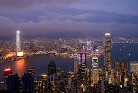 An evening view of the financial Central district and Victoria Harbour in Hong Kong, China, May 9, 2023.