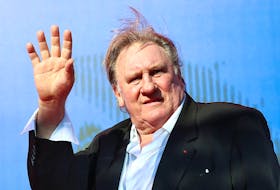 Gerard Depardieu waves as he arrives during a red carpet event for the movie "Novecento- Atto Primo" at the 74th Venice Film Festival in Venice, Italy, Italy September 5, 2017.  