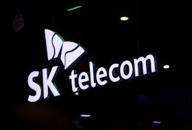 The logo of SK Telecom is pictured at the GSMA's 2023 Mobile World Congress (MWC) in Barcelona, Spain February 28, 2023.