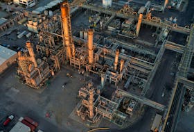 A general view of the Phillips 66 Company's Los Angeles Refinery, which processes domestic & imported crude oil into gasoline, aviation and diesel fuels, at sunset in Carson, California, U.S., March 11, 2022. Picture taken with a drone.