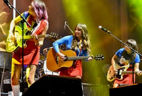 Les Hay Babies of New Brunswick – described as an Acadian indie folk trio – performing in Lower West Pubnico during on the 2022 National Acadian Day. TINA COMEAU PHOTO
