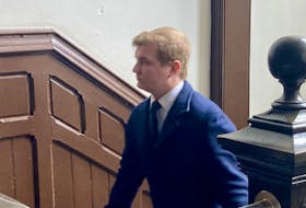Jake Milley, a master sailor in the Royal Canadian Navy, enters Halifax provincial court Monday. Milley, 29, received a conditional discharge after pleading guilty to committing an indecent act by exposing his genitals to a female sailor on HMCS Toronto during a deployment in 2020.