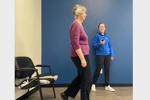 Zoomers physiotherapist, Heather MacAulay, uses her stopwatch while administering the Timed Up and Go (TUG) Test to measure her client Fran Nowakowski’s agility. Tracking a client's ability to do the TUG Test can help MacAulay identify if she is at high risk for falls. This knowledge helps her provide individualized guidance regarding which physical activities are safest and most appropriate for her. CONTRIBUTED