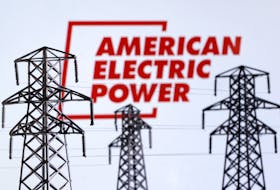 Electric power transmission pylon miniatures and American Electric Power logo are seen in this illustration taken, December 9, 2022.
