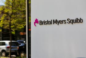 A sign stands outside a Bristol Myers Squibb facility in Cambridge, Massachusetts, U.S., May 20, 2021.