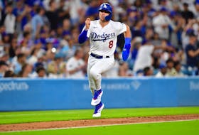 Aug 15, 2023; Los Angeles, California, USA; Los Angeles Dodgers shortstop Enrique Hernandez (8) runs home to score against the Milwaukee Brewers during the sixth inning at Dodger Stadium. Mandatory Credit: Gary A. Vasquez-USA TODAY Sports/File Photo
