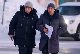 Lyudmila Navalnaya, the mother of late Russian opposition leader Alexei Navalny, and lawyer Vasily Dubkov arrive at the regional department of Russia's Investigative Committee in the town of Salekhard in the Yamal-Nenets Region, Russia February 17, 2024.