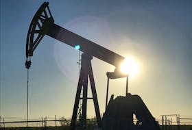A pump jack is seen at sunset near Midland, Texas, U.S., on May 3, 2017. Picture taken May 3, 2017.