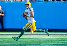 Dec 24, 2023; Charlotte, North Carolina, USA; Green Bay Packers quarterback Jordan Love (10) looks for a receiver against the Carolina Panthers during the second quarter at Bank of America Stadium. Mandatory Credit: Jim Dedmon-USA TODAY Sports/File Photo