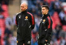 Soccer Football - Carabao Cup - Final - Manchester United v Newcastle United - Wembley Stadium, London, Britain - February 26, 2023  Manchester United assistant manager Mitchell van der Gaag and coach Eric Ramsay before the match