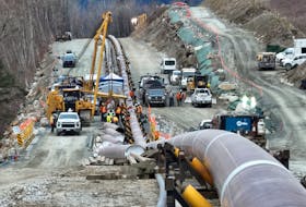 The last section of pipeline is assembled on the Trans Mountain pipeline expansion project before operations are expected to begin in the second quarter of 2024, near Laidlaw, British Columbia, Canada, February 18, 2024. 
