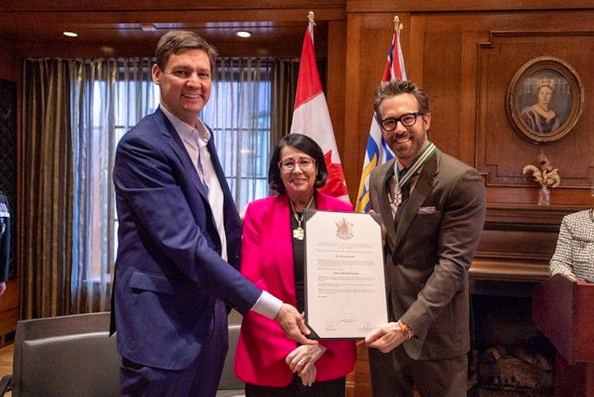  B.C. premier David Eby and lieutenant-governor Janet Austin present Vancouver native and Hollywood A-lister Ryan Reynolds with the Order of British Columbia in Vancouver.