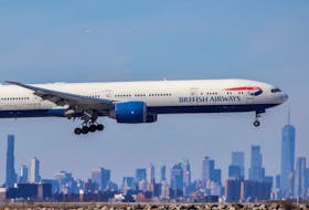 FILE - A Boeing 777 passenger aircraft of British Airways arrives from London at JFK International Airport in New York Feb. 7, 2024. A former British Airways employee allegedly ran a multi-million pound scam to evade Canadian immigration laws, according to a report in The Times of London.